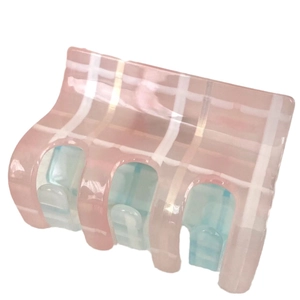 Pink and ice blue checkered acetate hair claw clip with a glossy finish for women