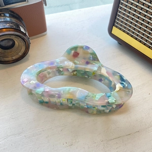 Colorful acetate cloud hair claw clip with artistic watercolor texture and gold lettering