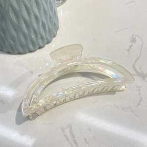 Iridescent white moon crescent acetate hair claw clip with elegant pearlescent finish