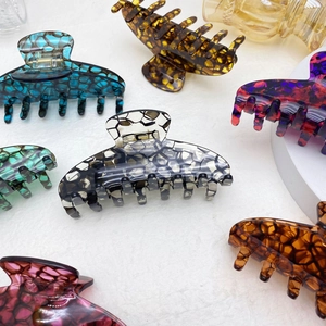 Large acetate hair claws with ink bubble texture in multiple elegant colors for women