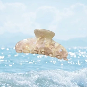 Grande pince à cheveux en acétate scintillante avec effet perlé sur vagues d'océan