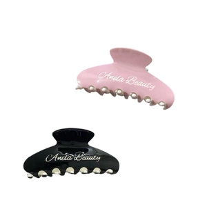 Pinces à cheveux minimalistes en acétate rose et noir avec impression de lettres chic