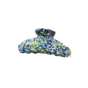 Large acetate hair claw clip with colorful floral zebra pattern in blue and green