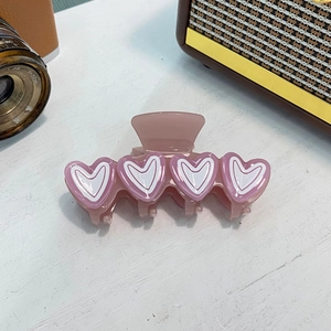 Elegante roze hart haarklem van acetaat voor dames in een zoete, minimalistische stijl
