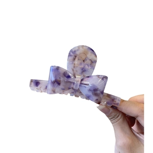 Pince à cheveux noeud en acétate marbré violet avec inscription France Handmade