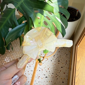 Iridescent acetate double-sided bow hair claw clip with a handmade pearlescent finish