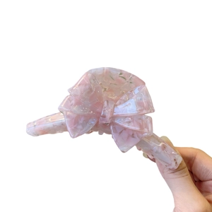 Pink and white marble acetate butterfly hair claw clip with handmade lettering detail