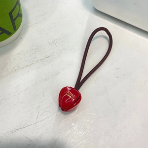 Élastique à cheveux tulipe rouge avec texte doré Handmade France sur cordon marron