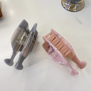 Pink and grey marble acetate hair claws with rhinestones for elegant styling