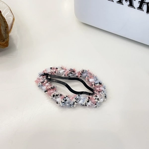 Hohlwolke Haarklammer mit rosa und blauem Tweed-Gewebe auf schwarzer Metallbasis