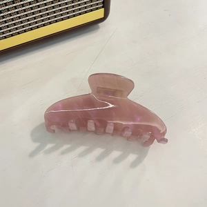Pink marble texture acetate hair claw clip with pearlescent finish for thick hair