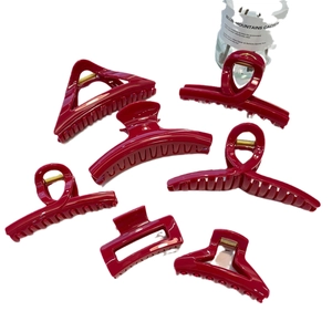 Lot élégant de sept pinces à cheveux rouges brillantes avec ressorts dorés robustes