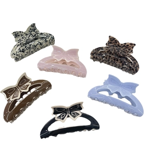 Set of 6 stylish acrylic bow butterfly hair claws in various patterns and colors