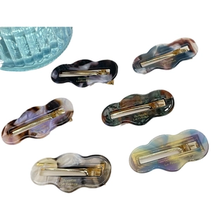 6-piece set of acetate marble texture hair clips with gold alloy base in assorted colors
