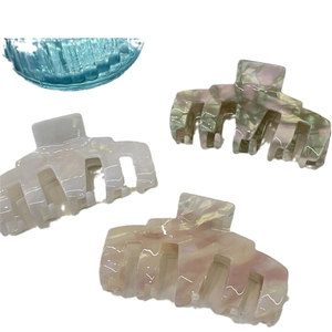 Three-piece large acetate hair claw set with pearl white and marble pattern textures