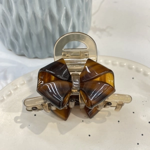 Elegant tortoiseshell acetic acid bow hair claw clip with golden MY BEAR print on side