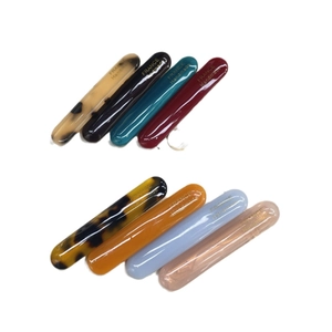 Elegant acetate duckbill hair clips in eight assorted colors with golden handmade lettering