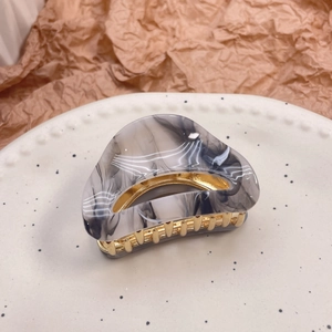 Minimalist marble pattern hair claw clip with golden metal accents for women hair accessory