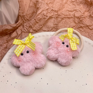 Par de gomas para el pelo de estrellas de peluche rosa con lazos de cuadros amarillos