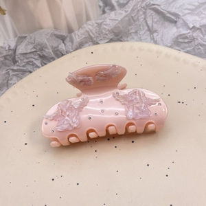 Pink acetate hair claw clip with carved angels and sparkling crystals for women