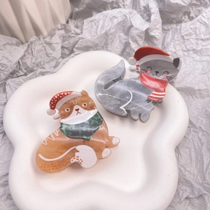 Détail de pinces à cheveux chat de Noël en acétate de qualité aux couleurs festives