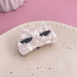 Cute cat-shaped acetate hair claw clip with marble texture and sunglass decor