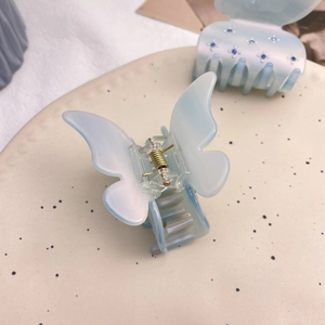 Pince à cheveux papillon en acétate bleu clair élégante avec strass et ressort doré