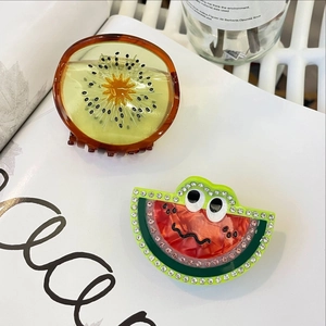 Cute fruit hair clips featuring kiwi and watermelon designs with rhinestones and eyes