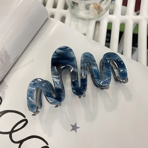 Blue marble acetic wave hair claw clip with metallic teeth for a stylish hairstyle
