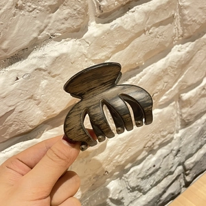 Large wood grain texture hair claw clip with semi-circle design for thick hair styling