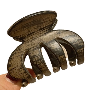 Classic large semicircular hair claw clip with wood grain texture for long hair