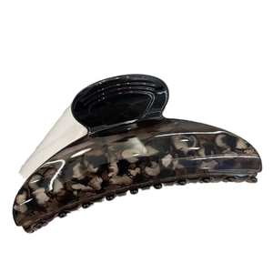 Large tortoiseshell marble pattern hair claw clip with glossy black and grey finish