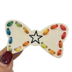 Cute star plush bow hair clip with colorful gradient yarn details for girls