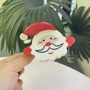 Simpatica molletta per capelli a Babbo Natale in acetato per acconciature natalizie