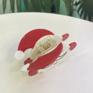 Molletta per capelli natalizia a forma di Babbo Natale in acetato rosso e bianco