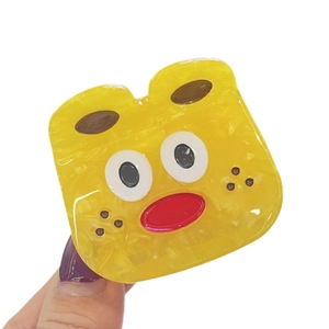 Pince à cheveux monstre jaune Y2K en acétate avec texture marbrée et yeux mignons