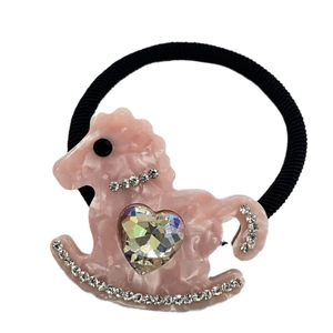 Y2K pink rocking horse hair tie with large heart crystal and rhinestone details