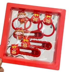 6-piece festive Chinese New Year hair accessories set with red fortune doll and gift bag charms