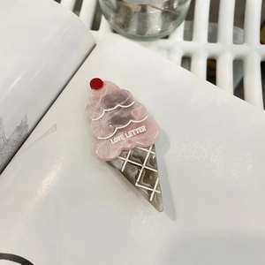 Cute ice cream shaped acetate hair clip with pink marble finish and Love Letter text