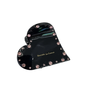 Pince à cheveux élégante en acétate noir en forme de cœur avec strass roses et détails dorés