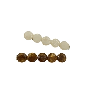 Elegant translucent and amber resin hair clip set with simple metal duckbill base