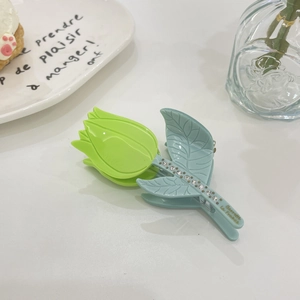 Elegant tulip hair claw clip in green and blue acetate with sparkling rhinestones