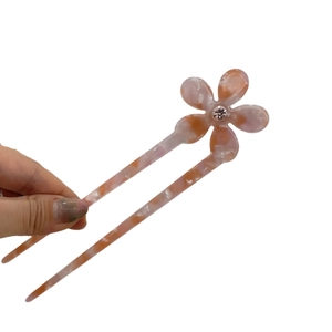 Elegant acetic acid flower hair fork with pink marble texture and rhinestone center