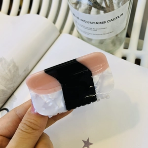 Creative sushi shaped hair claw clip made of acetate fiber with a pink and white design