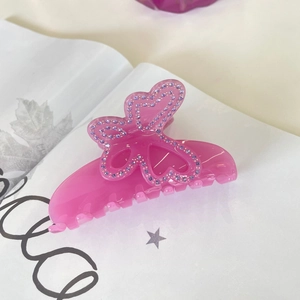 Pince à cheveux papillon en acétate rose élégante avec strass violets pour femmes