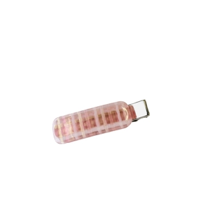 Pink jelly resin duckbill hair clip with white and gold plaid patterns on white background