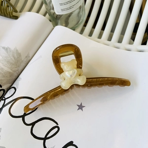 Large amber brown hair claw clip with cute cream bear doll and iridescent heart