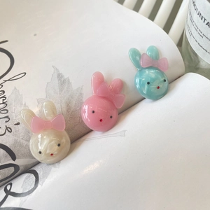 Cute resin rabbit hair clips in white, pink, and mint green colors for women