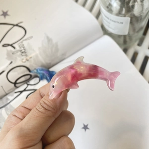 Pink glitter resin dolphin hair clip in minimalist Korean style for women and girls