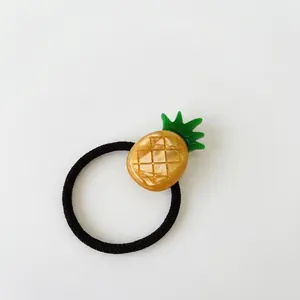 Cute pineapple hair tie with yellow resin fruit charm and black elastic nylon rope